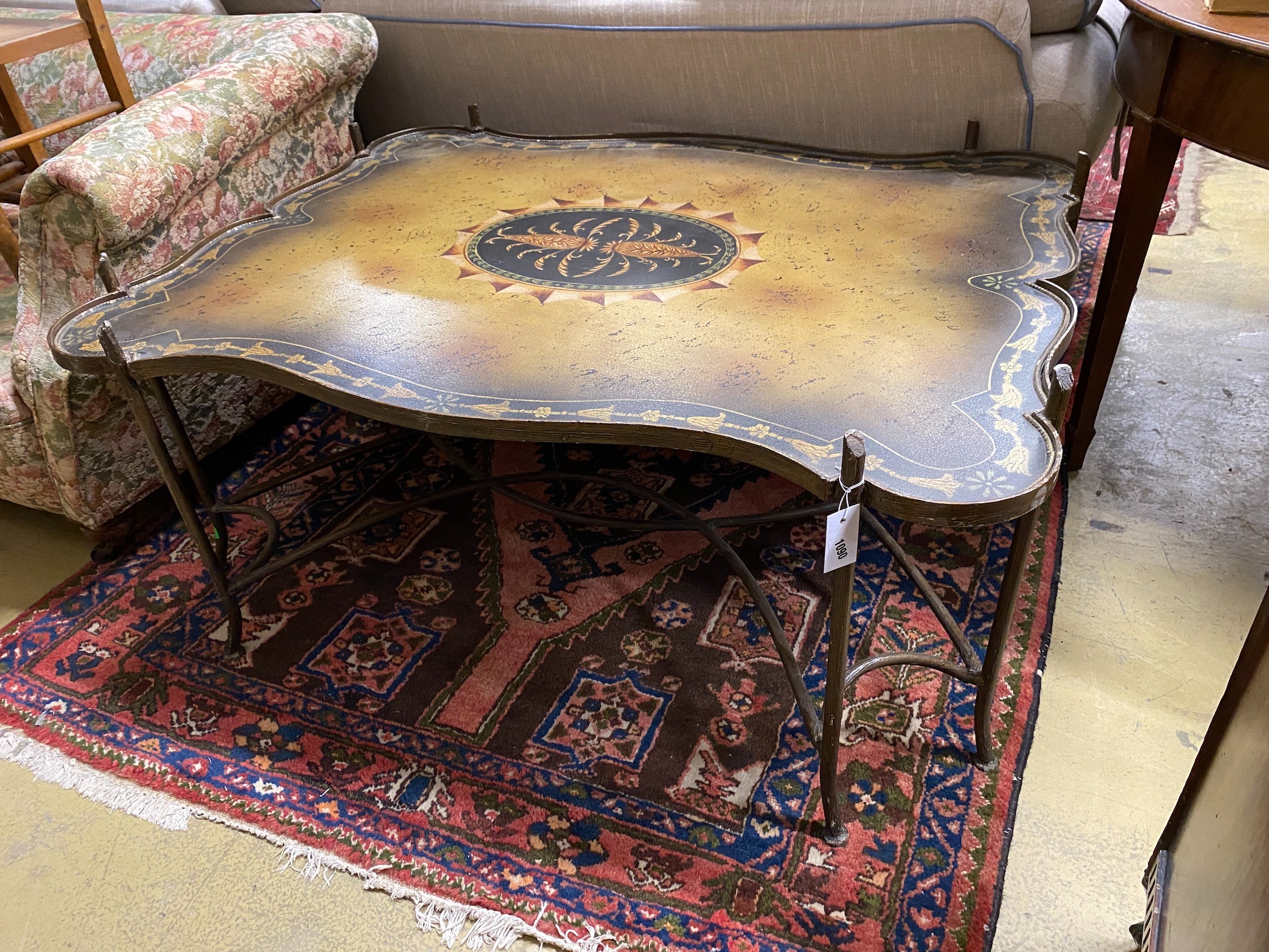 A painted wrought iron coffee table, width 122cm, depth 94cm, height 56cm